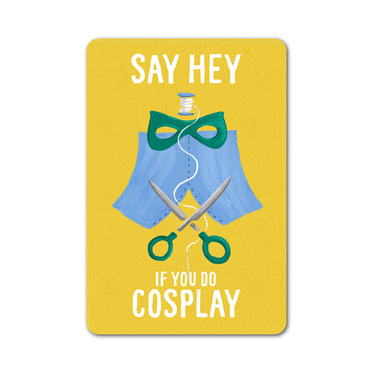 Say hey if you do cosplay sticker featuring a cape and scissors illustration.